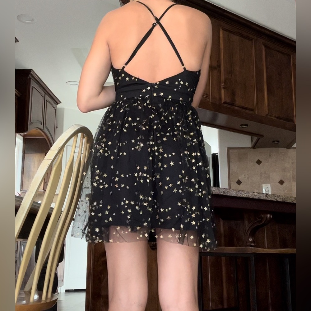 black with gold stars mini dress. new with tags
